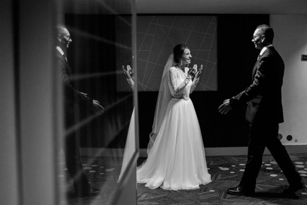 bride seeing her dad for the first time in the hotel in Toronto