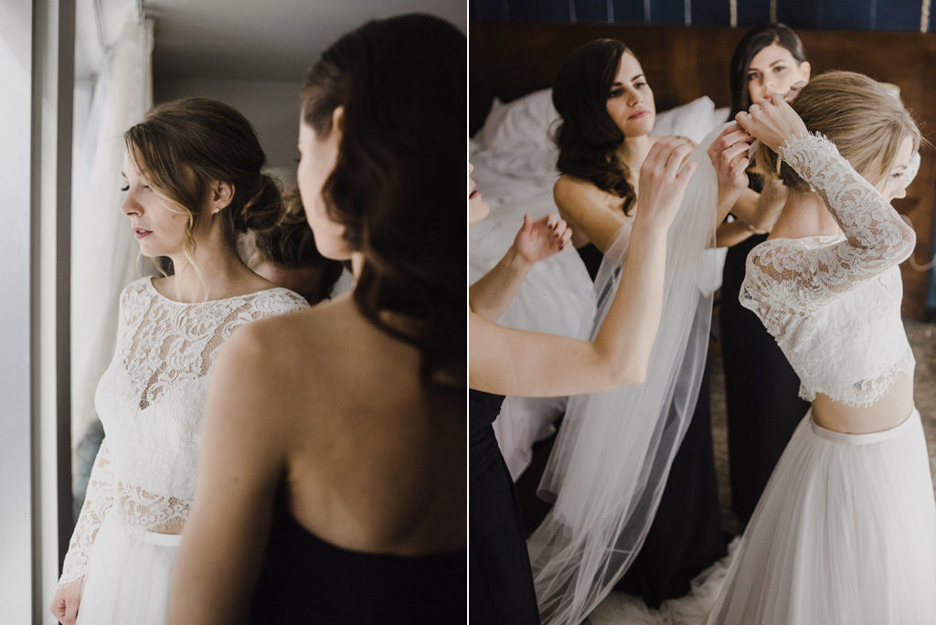 the bridesmaids are helping the bride secure her veil in her hair